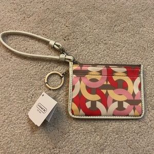 NWT Coach multi color wallet with C logo